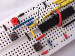 atmega8 on breadboard with switch and LED atmega8 on breadboard with switch and LED